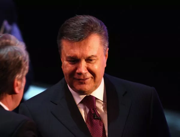 Виктор Янукович и украинската опозиция подписаха мирното споразумение
