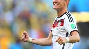 Швайни наследи Лам като капитан на Германия