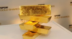 Златото поскъпна над 1 200 долара за тройунция