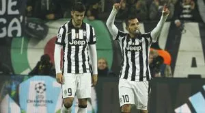 Тевес и Мората удариха по Борусия, но интригата остана за Дортмунд