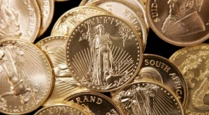 Златото продължава да пада под 1200 долара за тройунция