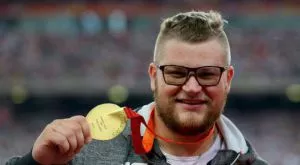 Куриоз! Световен шампион плати за такси с медала си от Пекин