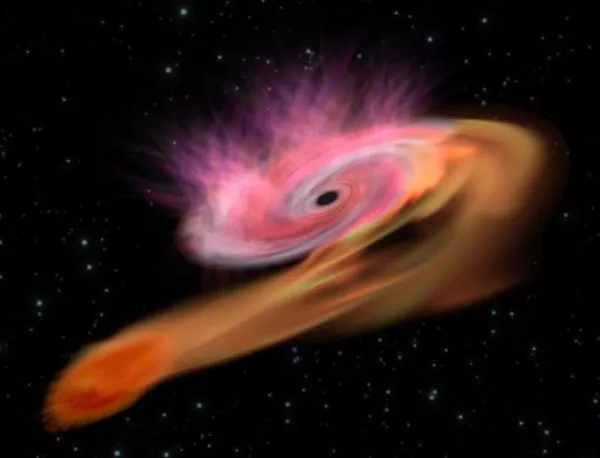 Черна дупка разкъсва звезда на части (ВИДЕО)