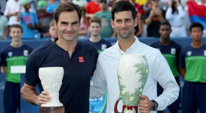 За първи път: Федерер и Джокович от една страна на корта