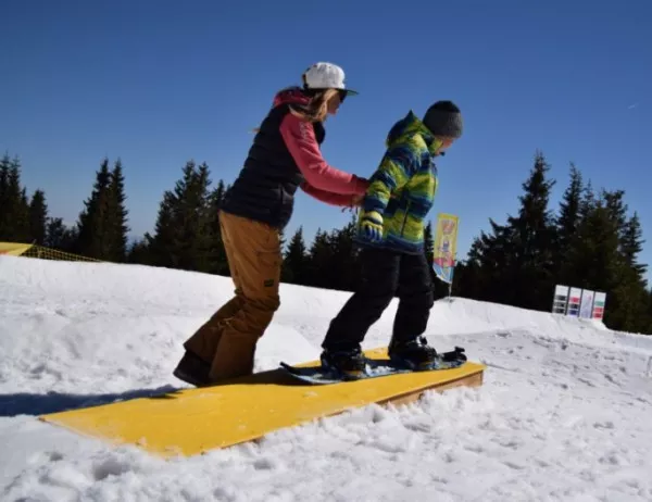Инструктори от цял свят обучават 136 деца от бедни семейства да карат ски и сноуборд
