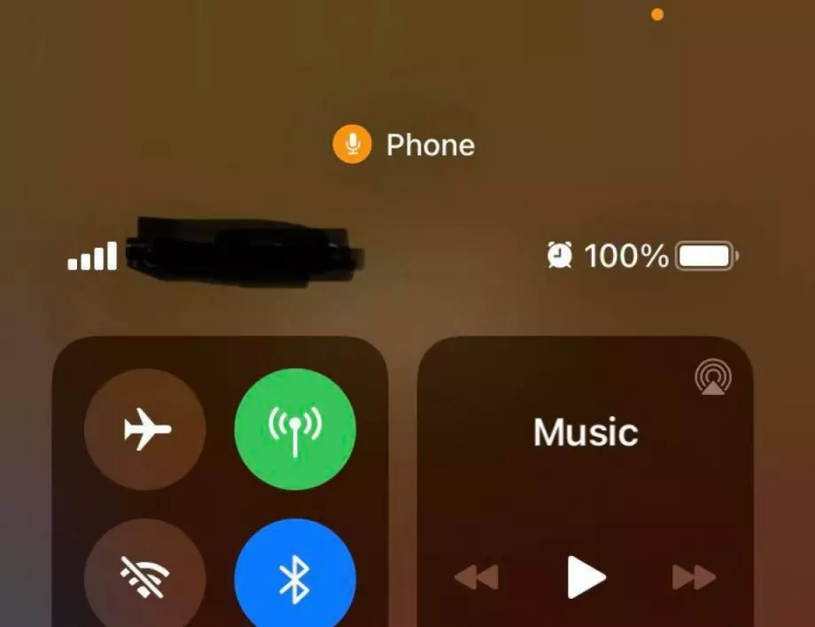 Какво означава оранжевата точка в iOS 14?