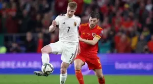 Експериментална Белгия се задоволи с "хикс" в Уелс